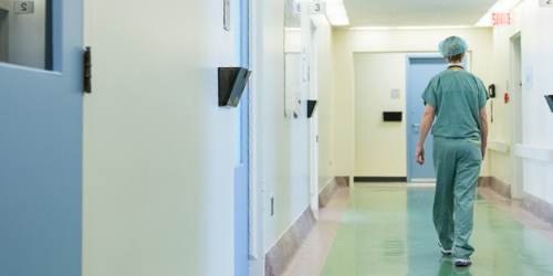 Person walking in hospital hallway