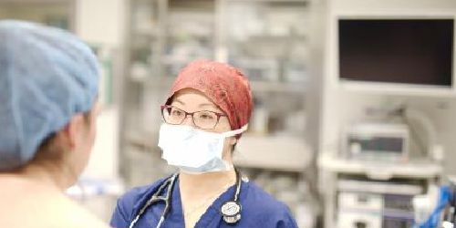 Female doctor with patient